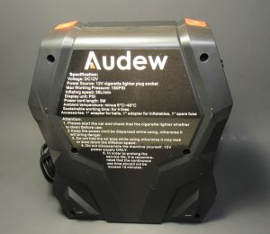 back of compressor on dark background